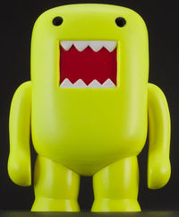 Cover image for 4” Domo Vinyl Figure: Black Light Yellow