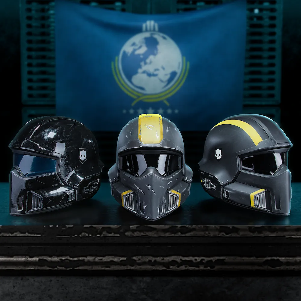 Helldivers 2 Tactical Helmets 1:1 Wearable together in front of Super Earth Flag